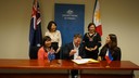 Senior Trade Commissioner Anthony Weymouth and PAHROD Facility Director Milalin S. Javellana sign the contract for Pushpin Movement, represented by group leader Ann Marie Cunanan, and group members Miday Umali and Lucita Dela Pena.  The contract signing was held last 22 October 2014 at the Australian Embassy.